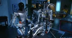 Совсем как в фантастических фильмах: Tesla показала, как два человекоподобных робота Optimus собирают третьего