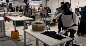 Humanoid robot Tesla Optimus folds T-shirt on table: Its capabilities expand (video)