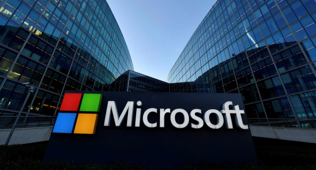 Microsoft's quarterly profit falls 14%, but beat analysts' forecasts