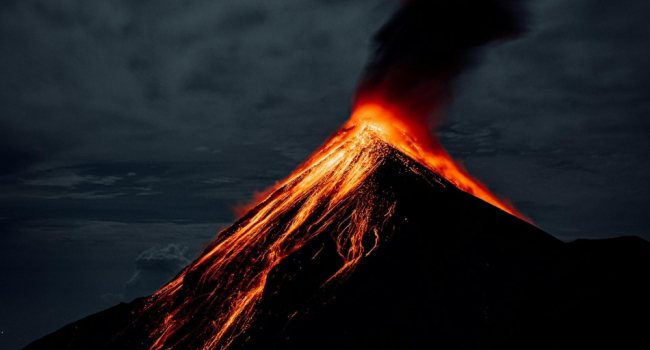 What role did volcanoes play in the origin of life on Earth?