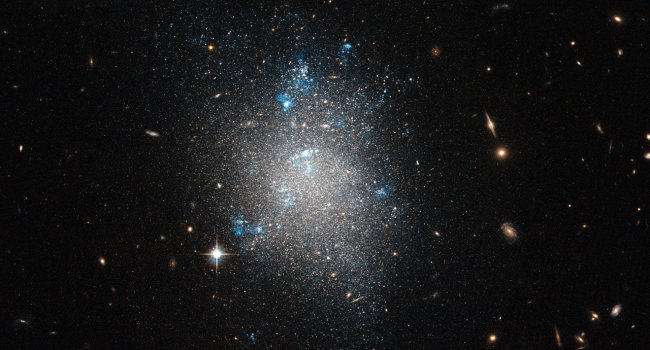 Dwarf galaxies challenge cosmology: A new discovery about dark matter